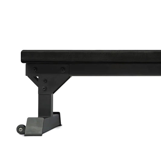 Black metal flat bench on a white background