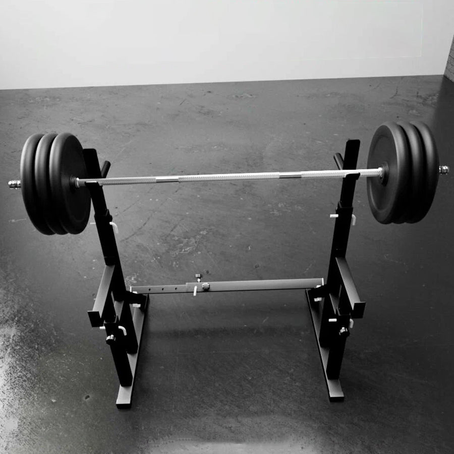 Barbell with weights on a weightlifting stand against a plain background
