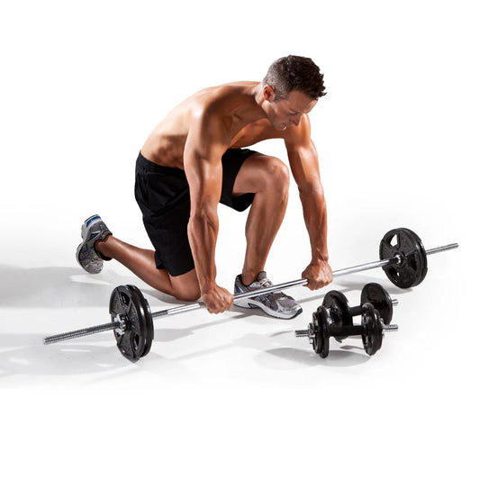 A man holding Barbell with weight plates on a white background