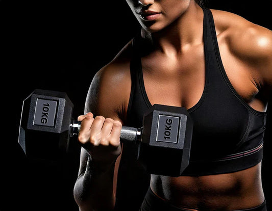 A girl holding Hex dumbbells on a black background