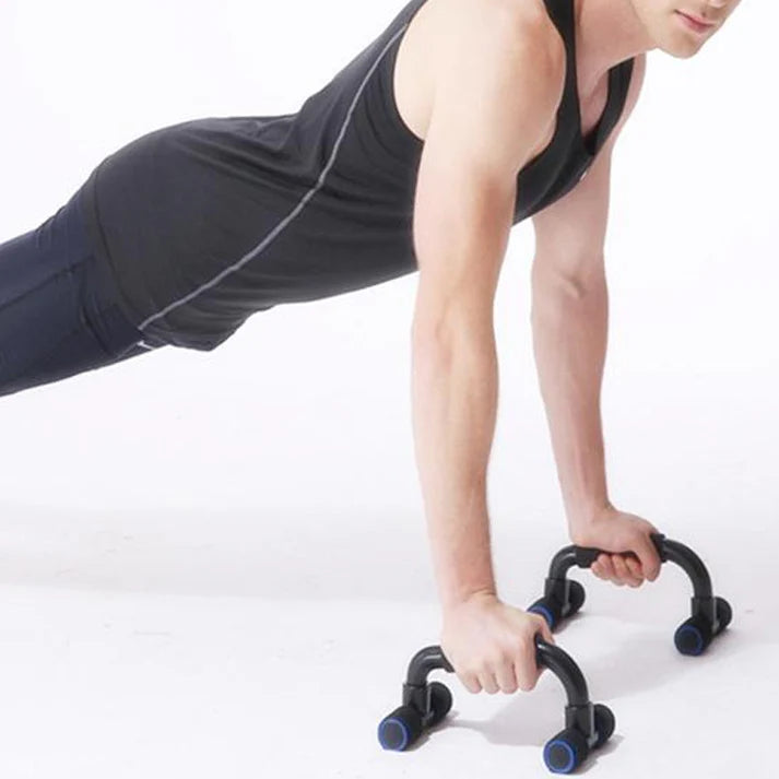 Person using a black and blue exercise device on a white background