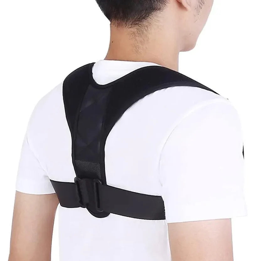 Person wearing a black posture corrector on a white background