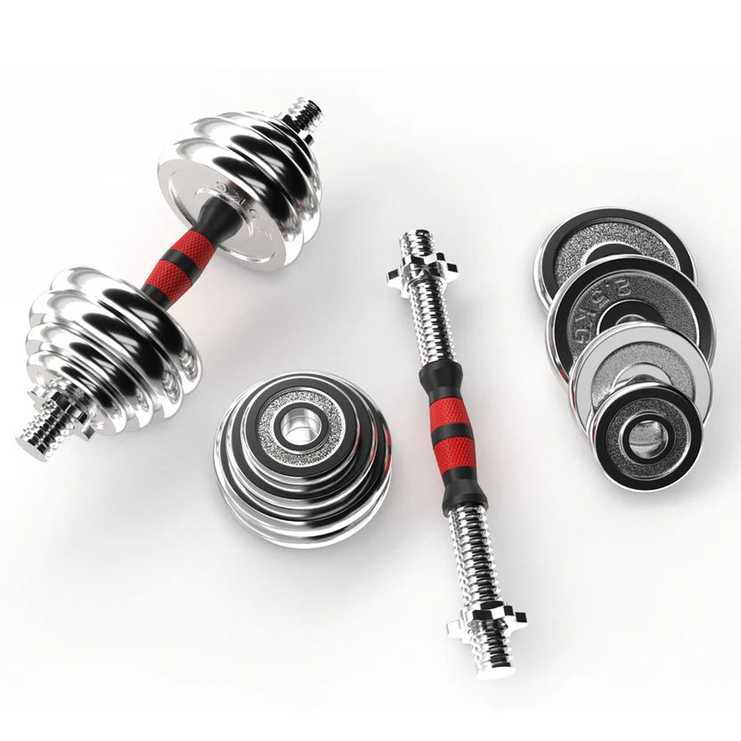 Set of adjustable dumbbells with weight plates on a white background
