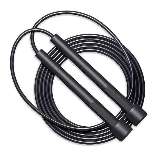 Black jump rope coiled on a white background