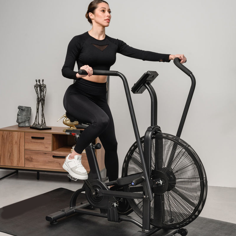 Professional Indoor Cycling Bike with Silent Belt Drive System - Adjustable Resistance Levels for All Fitness Levels - LCD Display with Performance Metrics - Ergonomic Comfort Seat and Handlebars -