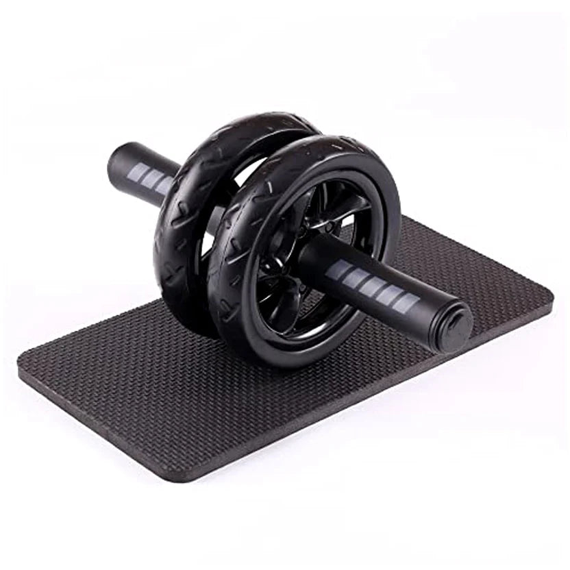 Black ab roller with mat on a white background