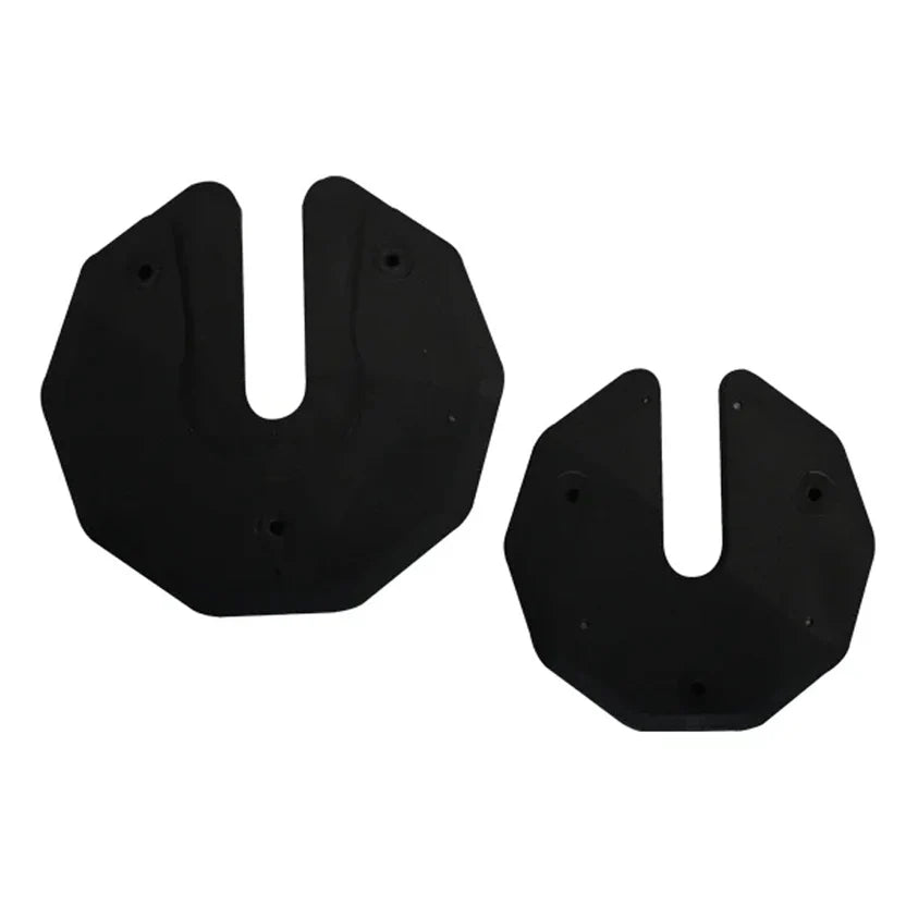 Two black rubber gaskets on a white background