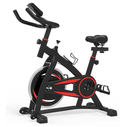 Black and red exercise bike on a white background