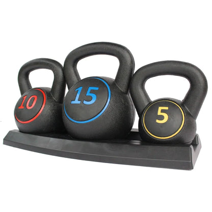 Set of three black kettlebells with weight markings on a white background