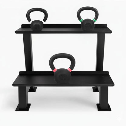 Black weight rack with three kettlebells on a white background