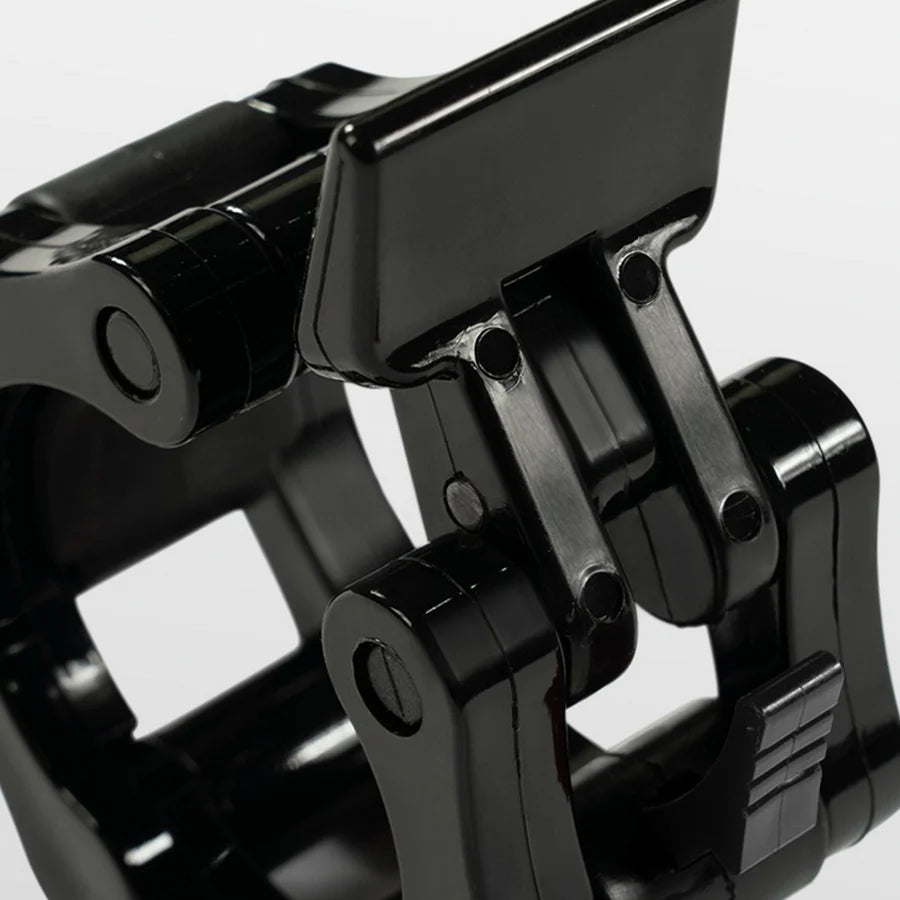 Close-up of a black metal bracket on a white background