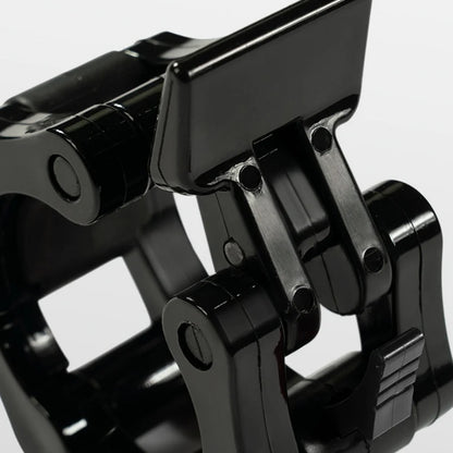 Close-up of a black metal bracket on a white background