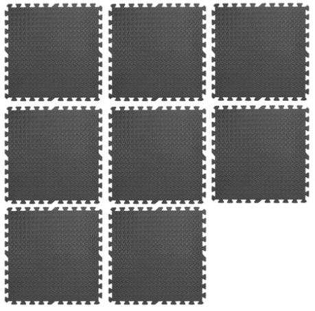 Grid of black foam puzzle floor mats with white borders on a white background