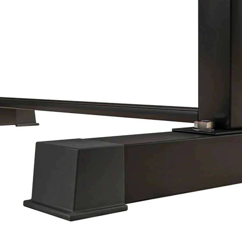 Close-up of a black metal bracket on a white background